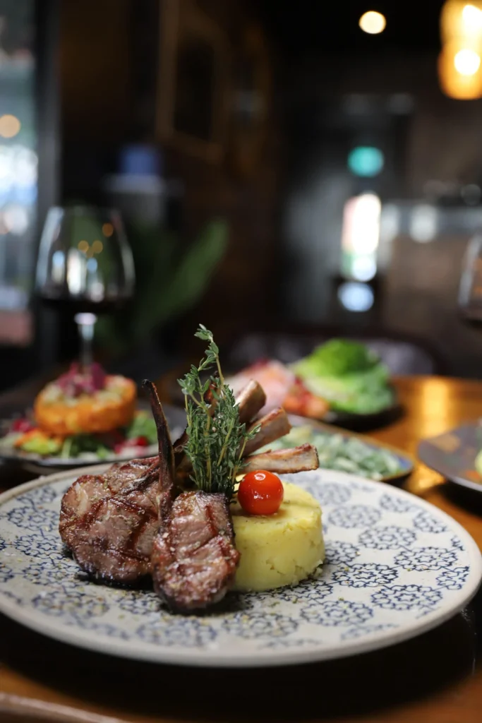 Grilled lamb chops with mash and wine