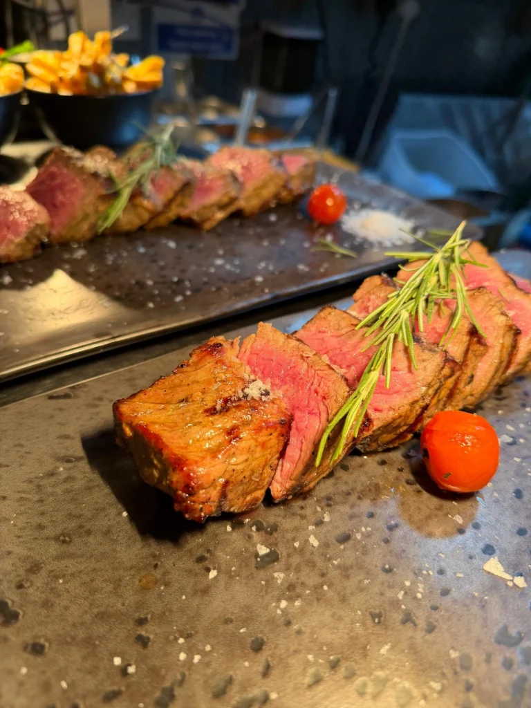Sliced steak with rosemary and sea salt